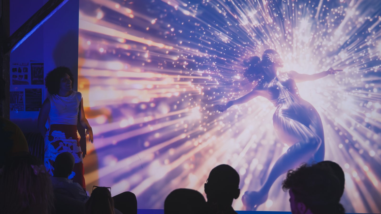 Where The Mind Goes: luminous figure in a burst of light during the AI video installation at Eyedrum